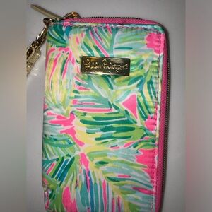 Lilly Pulitzer never used wallet and phone holder.
